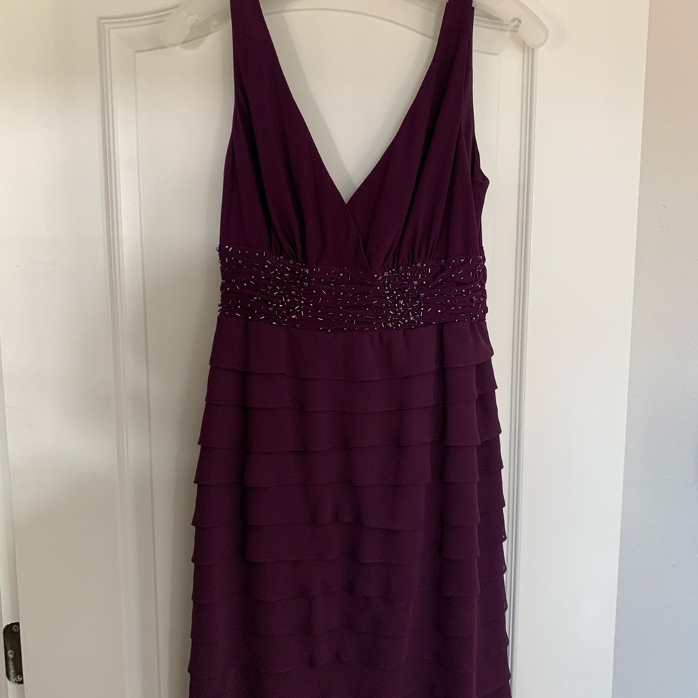 Plum dress with ruffle detail